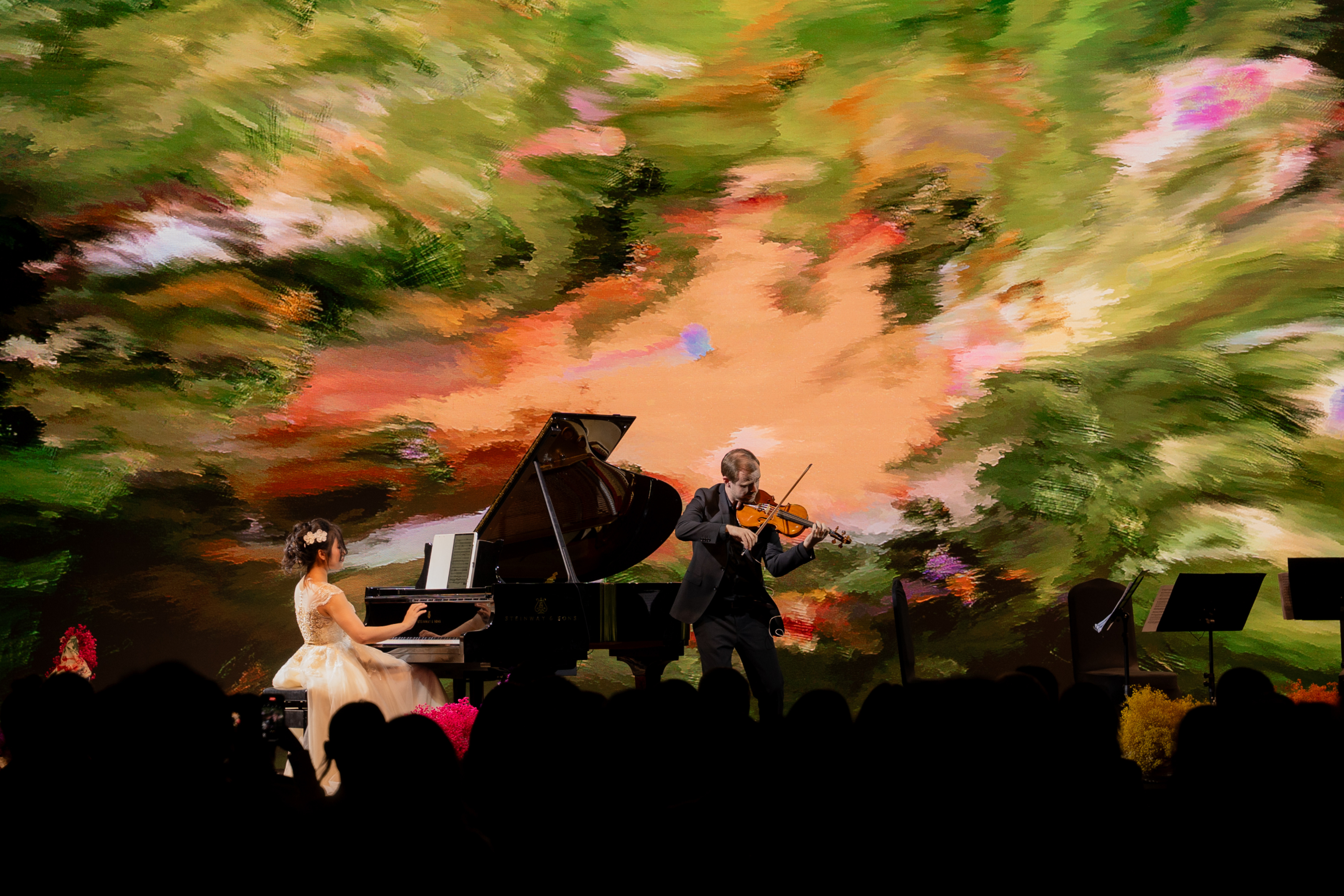 A pianist and violinist performing together