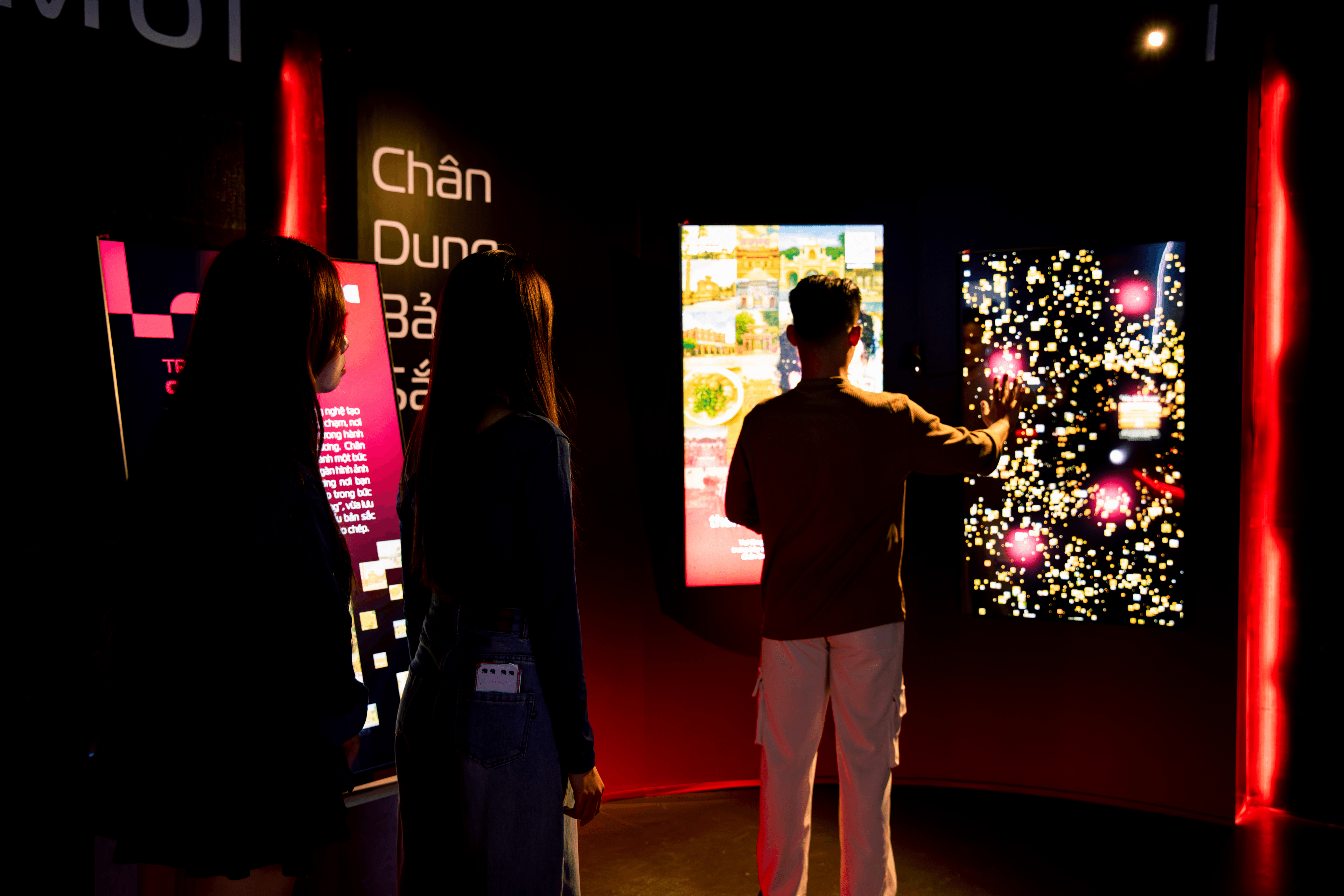 Visitors interacting with real-time generative artwork