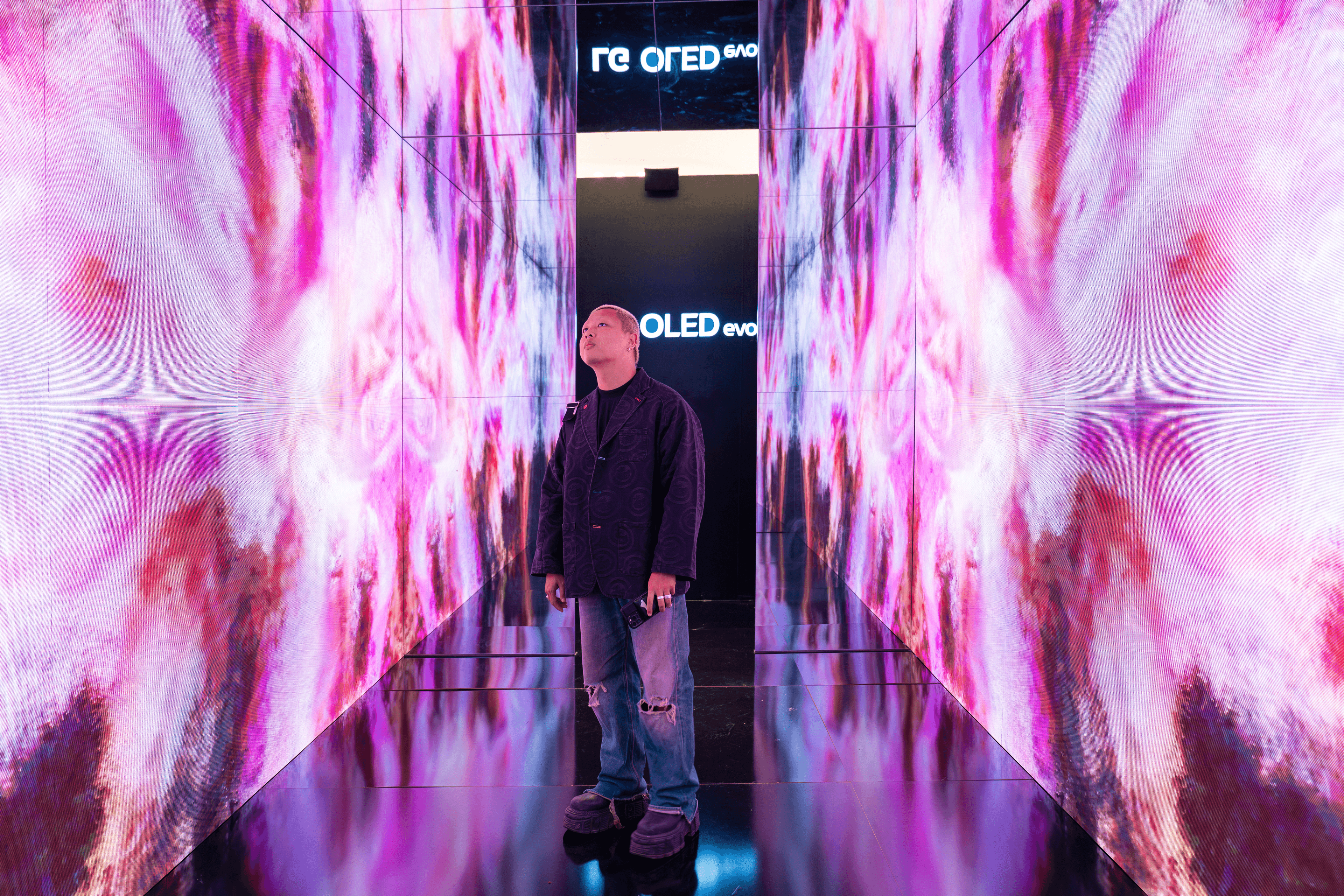 The audience on a journey through the layers of reality, exploring the deep interconnectedness of nature, technology, and the cosmos